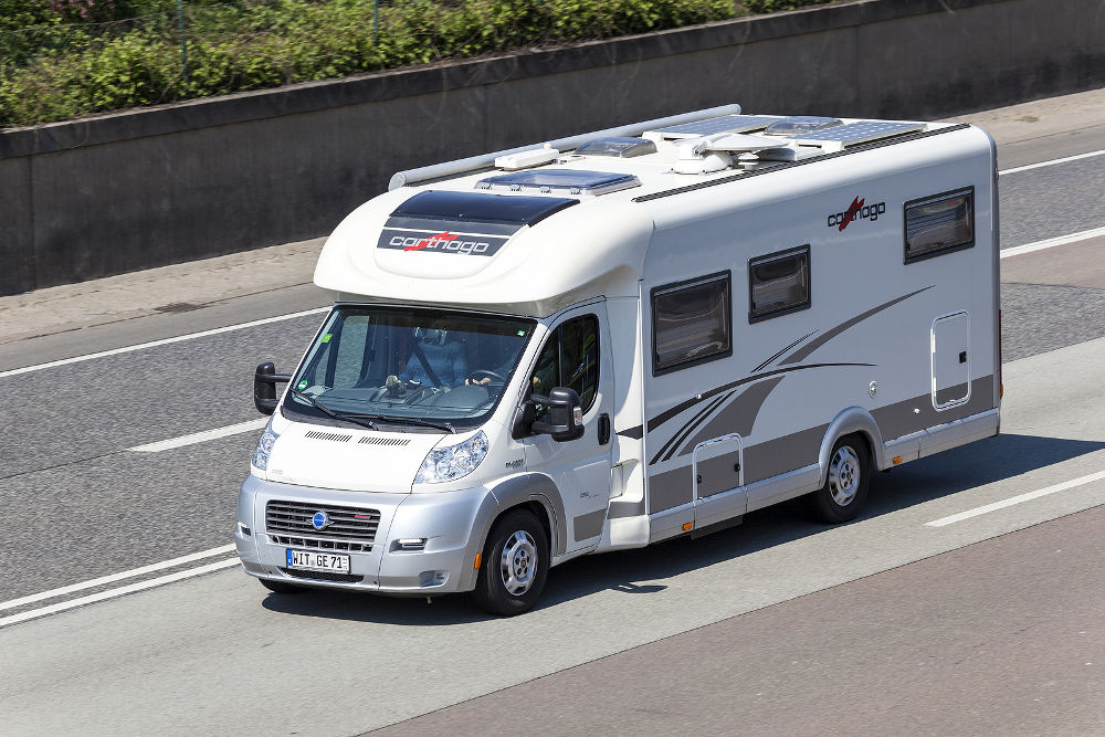 Luxury Carthago motorhome on the highway A5 direction south in Germany