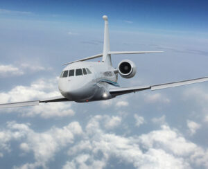 Frontal view of a private jet flying