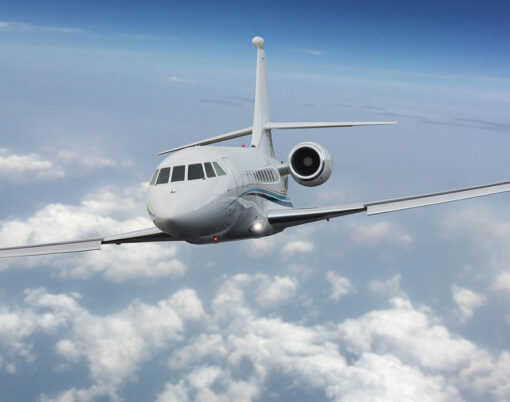 Frontal view of a private jet flying