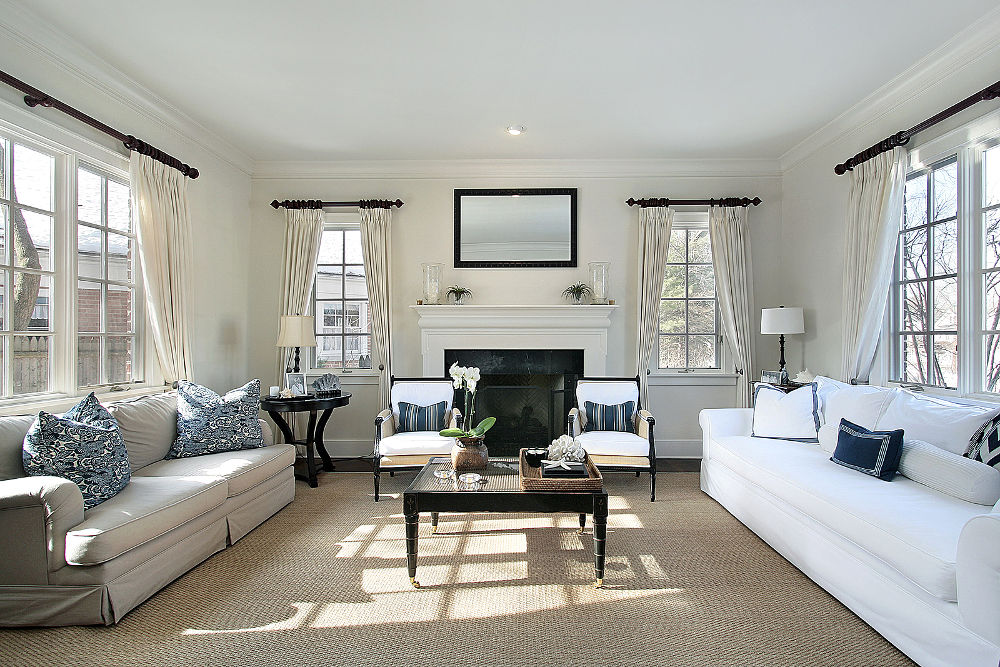 Living room in luxury home with fireplace