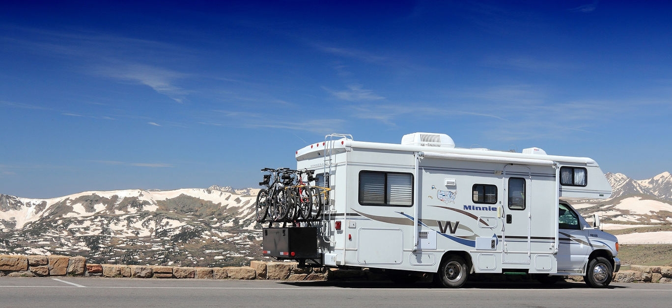 RV motorhome parked along Trail Ridge Road in Rocky Mountain National Park, Colorado