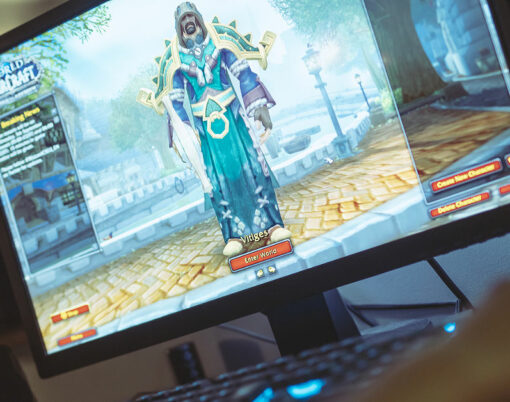 Woman playing World of Warcraft: Battle of Azeroth game