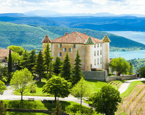 chateau and church in Aiguines and St Croix Lake at background, Var Department, Provence, France