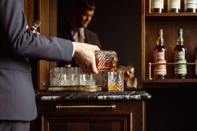 The Glendronach has partnered with Marine & Lawn Hotels & Resorts flagship property, Rusacks St Andrews, to launch a whisky lounge offering exclusive experiences. 

Opening its doors last month, it will provide domestic and international visitors with the opportunity to taste premium whisky from the company’s vast archive, including rare casks from Brown-Forman’s single malts portfolio no longer available for purchase. 

The members’ club-inspired space, named ‘Room 116’, boasts a bespoke bar showcasing a unique whisky collection which will offer all three of Brown-Forman’s single malts.